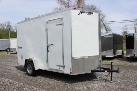 2024 HOMESTEADER 7&#39; X 12&#39; ENCLOSED CARGO TRAILER FOR SALE, WHITE EXTERIOR ALUMINUM, 24&quot; V-NOSE, 32&quot; SIDE DOOR WITH BAR LOCK, REAR RAMP DOOR WITH EXTENDED WOOD FLAP, 3/4&quot; PLYWOOD FLOOR, (4) FLOOR MOUNT D-RINGS, 3/8&quot; PLYWOOD WALLS, SIDE WALL FLOW THRU VENTS, DOME LIGHT, 3.5K IDLER AXLE, SPRING SUSPENSION, 15&quot; RADIAL TIRES, LED EXTERIOR LIGHTS, 84&quot; INTERIOR HEIGHT, 16&quot; ON CENTER WALL POSTS, A-FRAME JACK, 2&quot; COUPLER.