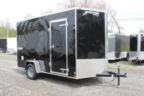 2024 HOMESTEADER 7&#39; X 12&#39; ENCLOSED CARGO TRAILER FOR SALE, BLACK EXTERIOR ALUMINUM, 24&quot; V-NOSE, 32&quot; SIDE DOOR WITH BAR LOCK, REAR RAMP DOOR WITH EXTENDED WOOD FLAP, 3/4&quot; PLYWOOD FLOOR, (4) FLOOR MOUNT D-RINGS, 3/8&quot; PLYWOOD WALLS, SIDE WALL FLOW THRU VENTS, DOME LIGHT, 3.5K IDLER AXLE, SPRING SUSPENSION, 15&quot; RADIAL TIRES, LED EXTERIOR LIGHTS, 84&quot; INTERIOR HEIGHT, 16&quot; ON CENTER WALL POSTS, A-FRAME JACK, 2&quot; COUPLER.