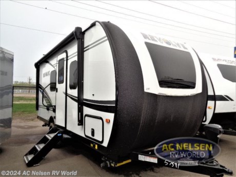 &lt;p&gt;&lt;strong&gt;Palomino Revolve travel trailer EV1 highlights:&lt;/strong&gt;&lt;/p&gt; &lt;ul&gt; &lt;li&gt;Full Rear Bath&lt;/li&gt; &lt;li&gt;Pantry&lt;/li&gt; &lt;li&gt;MORryde Solid Steps&lt;/li&gt; &lt;li&gt;Outside Storage&lt;/li&gt; &lt;li&gt;Convection Microwave&lt;/li&gt; &lt;/ul&gt; &lt;p&gt;&#160;&lt;/p&gt; &lt;p&gt;Enjoy time away from it all in this Revolve travel trailer that can sleep three each night. The &lt;strong&gt;Murphy bed&lt;/strong&gt; up front can be folded away in the morning so you can relax on the sofa, and there are &lt;strong&gt;dual wardrobes&lt;/strong&gt; here to keep your clothes tidy. Once you&#39;ve prepare breakfast on the two burner cooktop, you can dine at the &lt;strong&gt;booth dinette slide&lt;/strong&gt; out, or head outdoors under the 14&#39; patio awning. This model also includes a &lt;strong&gt;fireplace&lt;/strong&gt; that will be perfect for those cooler camping months.&#160;&lt;/p&gt; &lt;p&gt;&#160;&lt;/p&gt; &lt;p&gt;The Revolve travel trailers by Palomino are 100%&lt;strong&gt; powered by solar&lt;/strong&gt;, allowing you to go off the beaten path. Each model includes &lt;strong&gt;vacuum bonded construction&lt;/strong&gt; with Azdel, fully walkable roofs, and a hi-gloss gel coat front cap with Line X protection on the windshield. You&#39;ll appreciate the Off Grid package for all your charging needs. There are &lt;strong&gt;four 100-watt solar panels&lt;/strong&gt;, four Lithium batteries, an On Board battery charger and monitor panel, plus a tow vehicle power adapter. The &lt;strong&gt;solid surface countertops&lt;/strong&gt; found inside will be easy to keep clean, and the LED lighting will not only keep your space well lit, but will also use less power. Plan to go anywhere with a Revolve travel trailer!&lt;/p&gt;&lt;ul&gt;&lt;li&gt;Rear Bath&lt;/li&gt;&lt;li&gt;Murphy Bed&lt;/li&gt;&lt;/ul&gt;