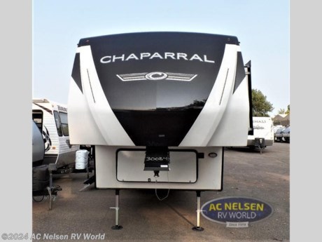 &lt;p&gt;&lt;strong&gt;Coachmen RV Chaparral Lite fifth wheel 30BHS highlights:&lt;/strong&gt;&lt;/p&gt; &lt;ul&gt; &lt;li&gt;Bunk Beds&lt;/li&gt; &lt;li&gt;Front Master Suite&lt;/li&gt; &lt;li&gt;Rear Living area&lt;/li&gt; &lt;li&gt;Booth Dinette&lt;/li&gt; &lt;li&gt;Exterior Speakers&lt;/li&gt; &lt;/ul&gt; &lt;p&gt;&#160;&lt;/p&gt; &lt;p&gt;This fifth wheel is big enough with &lt;strong&gt;two bedrooms&lt;/strong&gt; for the whole family to go camping! The front master suite not only has a queen bed to lay your head on at night and a wardrobe slide, but also an entrance into the &lt;strong&gt;dual entry bathroom&lt;/strong&gt; which has a 34&quot; x 34&quot; radius shower to clean up in each morning. The second bedroom has a set of 30&quot; x 74&quot; bunk beds with the top one being a flip-up, shoe storage, and overhead cabinets to keep the clutter at base. Grab some eggs from the 8 cu. ft. &lt;strong&gt;stainless steel refrigerator&lt;/strong&gt;, fry them up on the three burner cooktop, and enjoy them at the booth dinette. You can then read the morning newspaper on either the &lt;strong&gt;tri-fold hide-a-bed sofa&lt;/strong&gt; and theater seating or watch the news with the rear entertainment center!&lt;/p&gt; &lt;p&gt;&#160;&lt;/p&gt; &lt;p&gt;Comfort, convenience, and an easy haul is what you will find with each one of these Coachmen RV Chaparral Lite fifth wheels! Their aluminum framed sidewalls with &lt;strong&gt;rot proof Azdel&lt;/strong&gt; composite and Turn Tec engineering make them easy to tow with just a half-ton pickup truck. The durable, textured &lt;strong&gt;silver metal radius skirting&lt;/strong&gt; and the UV-resistant, white gel-coat exterior sidewalls panels will protect your unit for years to come. The &lt;strong&gt;Road Armor suspension&lt;/strong&gt; by Trail Air comes with heavy duty shackles and wet bolts so you can be sure it will hold up through every adventure. You will feel right at home inside with the &lt;strong&gt;Congoleum carefree resilient sheet flooring&lt;/strong&gt;, the USB charging charging ports, and the bath suites. Plus, there is an outside shower with hot and cold water to keep the dirt outdoors where it belongs. Come find your favorite model today!&lt;/p&gt;&lt;ul&gt;&lt;li&gt;Front Bedroom&lt;/li&gt;&lt;li&gt;Bunkhouse&lt;/li&gt;&lt;li&gt;Rear Living Area&lt;/li&gt;&lt;li&gt;Rear Entertainment&lt;/li&gt;&lt;/ul&gt;&lt;ul&gt;&lt;li&gt;10CU FT REFER IPO 8 CU FT REFER&lt;/li&gt;&lt;li&gt; 2&quot; RECEIVER HITCH ACCESSORY&lt;/li&gt;&lt;li&gt; 2ND A/C IN BEDROOM&lt;/li&gt;&lt;li&gt; 4-PT ELEC AUTO LEVELING&lt;/li&gt;&lt;li&gt; 50&quot; LED TELEVISION&lt;/li&gt;&lt;li&gt; CHAPARRAL LITE PACKAGE&lt;/li&gt;&lt;li&gt; COMFORT AIR FAN (KITCHEN ONLY)&lt;/li&gt;&lt;li&gt; NEBRASKA STATE SEAL&lt;/li&gt;&lt;li&gt; ROADSIDE ASSISTANCE&lt;/li&gt;&lt;li&gt; ROOF MOUNTED SOLAR PANEL&lt;/li&gt;&lt;/ul&gt;