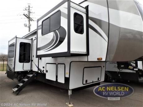 &lt;p&gt;&lt;strong&gt;Forest River Sandpiper Luxury fifth wheel 391FLRB highlights:&lt;/strong&gt;&lt;/p&gt; &lt;ul&gt; &lt;li&gt;Master Suite&lt;/li&gt; &lt;li&gt;Separate Living Room&lt;/li&gt; &lt;li&gt;Full and Half Bath&lt;/li&gt; &lt;li&gt;Theater Seating&lt;/li&gt; &lt;li&gt;Free-Standing Table with Chairs&lt;/li&gt; &lt;li&gt;Kitchen Island&lt;/li&gt; &lt;/ul&gt; &lt;p&gt;&#160;&lt;/p&gt; &lt;p&gt;No vacation plan is complete without this Sandpiper Luxury fifth wheel! The master suite is the star of the show with its king bed slide and full bathroom with &lt;strong&gt;dual-sink vanity&lt;/strong&gt;. There is another aspect of this unit that will also grab your attention, and that is the front separate living room. This room features a front entertainment center with fireplace and 50&quot; flat screen LED HDTV, two &lt;strong&gt;opposing tri-fold hide-a-bed sofas&lt;/strong&gt;, and theater seating. All of this makes the living room a perfect place to sit down with friends, and the sofas allow you to offer your friends a sleeping space if they choose to spend the night. The kitchen is centrally located, and it contains the half bathroom. As you work up a sweat cooking dinner on the &lt;strong&gt;four-burner range&lt;/strong&gt;, you&#39;ll be able to switch on the &lt;strong&gt;ceiling fan&lt;/strong&gt; to cool down, and you&#39;ll be able to store practically anything in the 22-cubic foot residential refrigerator.&lt;/p&gt; &lt;p&gt;&#160;&lt;/p&gt; &lt;p&gt;When a brand claims to be luxurious, you expect true luxury, and the Forest River Sandpiper Luxury fifth wheel delivers! The list of included features is outstanding, and the construction itself is top notch. Everything comes together on a welded aluminum-framed, vacuum-bonded laminated superstructure and a cambered powder-coated frame with rust prohibitor. There is a fully enclosed, heated underbelly and an &lt;strong&gt;unobstructed drop-frame pass-through&lt;/strong&gt; storage area with cable jacks and 110V outlet. Two LED-lit exterior speakers add some fun to the outside, and the docking station includes easy winterization, hot and cold spray port, black tank flush, and pull valves for tanks. But the true luxury is found inside with the 84&quot; interior height, &lt;strong&gt;residential countertops&lt;/strong&gt;, recessed residential lighting, &lt;strong&gt;extra-large picture windows&lt;/strong&gt;, LED-lit headboard, and &lt;strong&gt;premium sound bar&lt;/strong&gt; with built-in flush-mount DVD player. Each unit has also been prepped for a washer/dryer so that you can extend every trip and make your Sandpiper Luxury feel more like home.&lt;/p&gt;&lt;ul&gt;&lt;li&gt;Front Living&lt;/li&gt;&lt;li&gt;Rear Bath&lt;/li&gt;&lt;li&gt;Outdoor Kitchen&lt;/li&gt;&lt;li&gt;Kitchen Island&lt;/li&gt;&lt;li&gt;Bath and a Half&lt;/li&gt;&lt;li&gt;Front Entertainment&lt;/li&gt;&lt;/ul&gt;&lt;ul&gt;&lt;li&gt;2022 PLATINUM PACKAGE&lt;/li&gt;&lt;li&gt; 2022 SIGNATURE PACKAGE&lt;/li&gt;&lt;li&gt; CENTRAL VACUUM&lt;/li&gt;&lt;li&gt; MAXX AIR FAN W/RAIN SENSOR IN KITCHEN&lt;/li&gt;&lt;li&gt; NEBRASKA STATE SEAL&lt;/li&gt;&lt;li&gt; WASHER AND DRYER&lt;/li&gt;&lt;/ul&gt;
