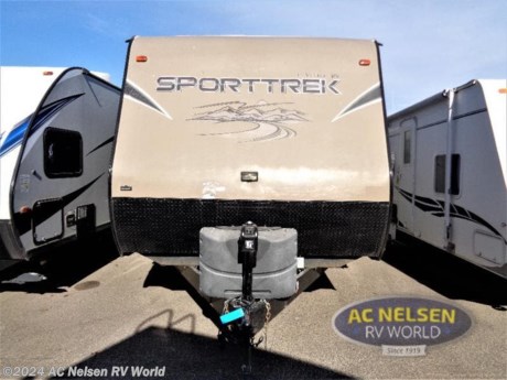 &lt;p&gt;Two entry doors, a rear kitchen area, and a single slide are just some of the features that you will find in the SportTrek 250VRK travel trailer by Venture RV.&lt;br&gt;&lt;br&gt;As you enter the rear entrance, along the rear wall you will find a pantry, three burner range, double kitchen sink, lots of extra counter space, and an overhead cabinet. The slide has a refrigerator, sofa with overhead cabinet, and wardrobe. The opposite side of the travel trailer offers a grand dinette and a TV mount above. &lt;br&gt;&lt;br&gt;The side aisle bath has a closet, corner shower, sink, medicine cabinet,&#160;and toilet.&lt;br&gt;&lt;br&gt;In the front you will find the bedroom with a comfortable queen bed, two shirt closets nightstands, and an overhead cabinet. On the wall there is a TV mount. The bedroom also offers a private entrance outside. &lt;br&gt;&lt;br&gt;Outside of the trailer there is a 20&#39; awning which provides a nice shade from the sun. There is also a pass-thru storage area under the front bedroom, plus so much more!&lt;/p&gt;&lt;ul&gt;&lt;li&gt;Front Bedroom&lt;/li&gt;&lt;li&gt;Two Entry/Exit Doors&lt;/li&gt;&lt;li&gt;Rear Kitchen&lt;/li&gt;&lt;/ul&gt;