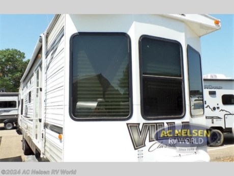 &lt;p&gt;The Salem Villa 39FDEN destination trailer by Forest River features double slides and a front living area.&lt;/p&gt; &lt;p&gt;As you enter the destination trailer, to the right there is an entertainment center. Along the front of the traielr there is a sofa with end tables on either side of the sofa. The slide has a lounge chair, sofa, and dinette.&lt;/p&gt; &lt;p&gt;Proceeding down the hall you will come to a side aisle bath. Inside the bathroom you will find a toilet, wardrobe, neo-angle shower or optional neo-angle tub, sink and medicine cabinet.&lt;/p&gt; &lt;p&gt;In the rear bedroom there is a queen bed slide, vanity, wardrobe and optional washer and dryer.&lt;/p&gt;&lt;ul&gt;&lt;li&gt;Front Living&lt;/li&gt;&lt;li&gt;Two Entry/Exit Doors&lt;/li&gt;&lt;li&gt;Rear Bedroom&lt;/li&gt;&lt;/ul&gt;
