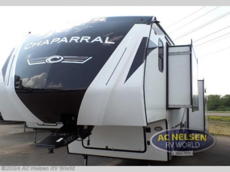 &lt;p&gt;&lt;strong&gt;Coachmen RV Chaparral Lite fifth wheel 30RLS highlights:&lt;/strong&gt;&lt;/p&gt; &lt;ul&gt; &lt;li&gt;Front Master Suite&lt;/li&gt; &lt;li&gt;Rear Living Area&lt;/li&gt; &lt;li&gt;Kitchen Island&lt;/li&gt; &lt;li&gt;Dual Entry Bathroom&lt;/li&gt; &lt;li&gt;Exterior Speakers&lt;/li&gt; &lt;/ul&gt; &lt;p&gt;&#160;&lt;/p&gt; &lt;p&gt;Get ready for a luxurious getaway in this fifth wheel! The rear living area is the perfect place to wind down your nights by relaxing on either the &lt;strong&gt;78&quot; tri-fold hide-a-bed sofa&lt;/strong&gt; or the theater seating across from the entertainment center. You could even play a few card games at the booth dinette while enjoying snacks that were stored in the residential pantry. The kitchen island comes with &lt;strong&gt;two bar stools&lt;/strong&gt; so you can have two helpers get dinner ready while you&#39;re cooking on the three burner cooktop. The dual entry bathroom is easy for everyone to access and has a &lt;strong&gt;radius shower&lt;/strong&gt;&#160;with glass doors to freshen up in, plus it leads directly into the front master suite where you will find a queen bed to lay your head on at night and a &lt;strong&gt;wardrobe/linen slide&lt;/strong&gt; to keep your clothes looking their best!&lt;/p&gt; &lt;p&gt;&#160;&lt;/p&gt; &lt;p&gt;Comfort, convenience, and an easy haul is what you will find with each one of these Coachmen RV Chaparral Lite fifth wheels! Their Tri-Tex powder coated frame technology is up to 5X more weather resistant, and the dual-sided &lt;strong&gt;Azdel composite sidewall panels&lt;/strong&gt; is ultra durable. The &lt;strong&gt;Road Armor suspension&lt;/strong&gt; by Trail Air comes with heavy duty shackles and wet bolts so you can be sure it will hold up through every adventure, and you might want to add the Furrion exterior back-up and sideview camera prep for easy parking. You will feel right at home inside with roller night shades,&lt;strong&gt; Thomas Payne furniture&lt;/strong&gt;, a high BTU output modern electric fireplace, and many more comforts! The exterior is just as inviting with its electric awning with LED lights, &lt;strong&gt;Solid Step entry steps&lt;/strong&gt;, and pass-through storage for all your gear!&lt;/p&gt; &lt;p&gt;&#160;&lt;/p&gt;&lt;ul&gt;&lt;li&gt;Front Bedroom&lt;/li&gt;&lt;li&gt;Rear Living Area&lt;/li&gt;&lt;li&gt;Kitchen Island&lt;/li&gt;&lt;/ul&gt;&lt;ul&gt;&lt;li&gt;10 CU FT REFER IPO 8 CU FT REFER&lt;/li&gt;&lt;li&gt; 2ND A/C IN BEDROOM&lt;/li&gt;&lt;li&gt; CHAPARRAL LITE PACKAGE&lt;/li&gt;&lt;li&gt; FREE STANDING TABLE &amp; 4 CHAIRS&lt;/li&gt;&lt;li&gt; NEBRASKA STATE SEAL&lt;/li&gt;&lt;li&gt; ROADSIDE ASSISTANCE&lt;/li&gt;&lt;li&gt; ROOF MOUNTED SOLAR PANEL&lt;/li&gt;&lt;/ul&gt;