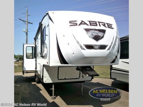 &lt;p&gt;&lt;strong&gt;Forest River Sabre fifth wheel 32GKS highlights:&lt;/strong&gt;&lt;/p&gt; &lt;ul&gt; &lt;li&gt;King Bed Slide Out&lt;/li&gt; &lt;li&gt;12&#39; Power Awning&lt;/li&gt; &lt;li&gt;Theater Seating&lt;/li&gt; &lt;li&gt;Outside Refrigerator&lt;/li&gt; &lt;li&gt;Kitchen Hutch&lt;/li&gt; &lt;/ul&gt; &lt;p&gt;&#160;&lt;/p&gt; &lt;p&gt;You will feel right at home in this fifth wheel! The rear living area includes a&lt;strong&gt;&#160;tri-fold sofa&lt;/strong&gt;, a TV with a fireplace below, and theater seating for two making this space a second bedroom at night for guests. In the morning, you can prepare breakfast on the &lt;strong&gt;kitchen island&lt;/strong&gt; and three burner range, then dine together at the free-standing&lt;strong&gt; table with bench seating and two chairs&lt;/strong&gt;. There is plenty of storage space here, including a pantry, a hutch, and overhead cabinets. The full bath will allow you to stay clean throughout your trip, and you&#39;ll feel right at home in the &lt;strong&gt;front private bedroom&lt;/strong&gt; with a king bed. This model also includes an outside refrigerator for snacks, plus&#160;pass-thru storage for all your gear!&lt;/p&gt; &lt;p&gt;&#160;&lt;/p&gt; &lt;p&gt;You will experience luxurious camping trips at an affordable price with any one of these Forest River Sabre fifth wheels! These models are durable and ready to travel anytime of the year thanks to features like the &lt;strong&gt;high-gloss gel-coat front cap&lt;/strong&gt; with LED lighting, the PVC roof membrane, and the forced air underbelly with enclosed gate valves. The &lt;strong&gt;electric auto-leveling system&lt;/strong&gt; makes setting up easy and safe, and the adjustable power awning with LED lighting will create an inviting outdoor living space. Each model includes a &lt;strong&gt;universal docking station&lt;/strong&gt; which includes a black tank flush and an outside shower, and detachable and adjustable stable steps for you to enter and exit the unit safely. Inside, you will love the design of the ambient accent lighting above the crown molding in the living area, the &lt;strong&gt;real wood lumbercore cabinetry&lt;/strong&gt;, and the vintage gaslight decorative lighting!&lt;/p&gt;&lt;ul&gt;&lt;li&gt;Front Bedroom&lt;/li&gt;&lt;li&gt;Rear Living Area&lt;/li&gt;&lt;li&gt;Kitchen Island&lt;/li&gt;&lt;/ul&gt;&lt;ul&gt;&lt;li&gt;BISTRO KITCHEN PACKAGE&lt;/li&gt;&lt;li&gt; CONVENIENCE PACKAGE&lt;/li&gt;&lt;li&gt; JUICE PACK W/100 WATT SOLAR PANEL&lt;/li&gt;&lt;li&gt; ULTIMATE COMFORT PACKAGE&lt;/li&gt;&lt;/ul&gt;