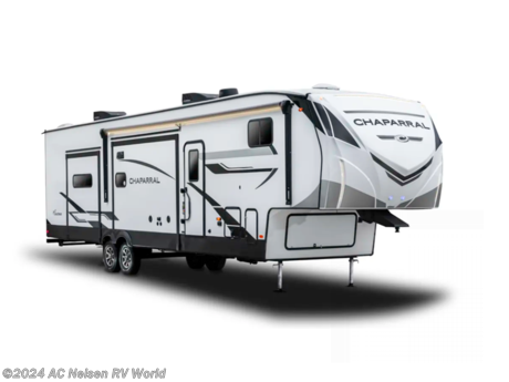 &lt;p&gt;&lt;strong&gt;Coachmen RV Chaparral Mid-Profile fifth wheel 381DBL highlights:&lt;/strong&gt;&lt;/p&gt; &lt;ul&gt; &lt;li&gt;Loft&lt;/li&gt; &lt;li&gt;Kitchen Island&lt;/li&gt; &lt;li&gt;Theater Seating&lt;/li&gt; &lt;li&gt;Two Master Suites&lt;/li&gt; &lt;li&gt;Hutch&lt;/li&gt; &lt;/ul&gt; &lt;p&gt;&#160;&lt;/p&gt; &lt;p&gt;One look at this fifth wheel and you&#39;ll be sold! There are an impressive two master suites; one up front with a queen bed and full bath, and one towards the back with a&lt;strong&gt; king bed slide&lt;/strong&gt; and &lt;strong&gt;second full bath&lt;/strong&gt;! There are even &lt;strong&gt;dual bath sinks&lt;/strong&gt; in the rear bath for added convenience! The middle living area includes dual opposing slides, a tri-fold sofa, plus theater seating and a &lt;strong&gt;free-standing table&lt;/strong&gt; for ample seating, dining, and sleeping space. There is also an entertainment center with a 50&quot; HD LED TV to wash away those rainy day blues. The chef of your crew will have a 21&quot; stainless steel oven with a residential cooktop and a stainless residential microwave to cook meals each day, a kitchen island for more counter space, and a&lt;strong&gt; 17 cu. ft. 12V refrigerator&lt;/strong&gt; for food storage.&#160;&lt;/p&gt; &lt;p&gt;&#160;&lt;/p&gt; &lt;p&gt;Each Chaparral mid-profile fifth wheel by Coachmen is designed with residential features, loads of storage space, and roomy bedroom suites to make you feel right at home. The durable construction means you can enjoy your RV for years to come. There&#39;s 6X double &lt;strong&gt;Azdel aluminum cage sidewall system&lt;/strong&gt;, Weather Shield+ technology, and Tri-Tex powder coated frame technology that will allow you to camp year around. Each model includes a &lt;strong&gt;Winegard Air 360&lt;/strong&gt; HDTV/radio dome antenna and an AM/FM stereo with Bluetooth and USB ports to keep you entertained, plus &lt;strong&gt;roller night shades&lt;/strong&gt; and a modern electric fireplace to make your space cozy. There is also a large transom window in the kitchen, a modern high-rise faucet, LED motion sensor lights in the bathroom, plus a &lt;strong&gt;full-size shower&lt;/strong&gt; with glass doors and a seat. Now that&#39;s what I call luxury! Choose a Chaparral fifth wheel today!&lt;/p&gt;&lt;ul&gt;&lt;li&gt;Front Bedroom&lt;/li&gt;&lt;li&gt;Rear Bath&lt;/li&gt;&lt;li&gt;Kitchen Island&lt;/li&gt;&lt;li&gt;Loft&lt;/li&gt;&lt;li&gt;Two Full Baths&lt;/li&gt;&lt;/ul&gt;&lt;ul&gt;&lt;li&gt;3RD A/C&lt;/li&gt;&lt;li&gt; 4 - POINT ELECTRIC AUTO LEVELING&lt;/li&gt;&lt;li&gt; EXTERIOR CONVENIENCE PACKAGE&lt;/li&gt;&lt;li&gt; INTERIOR CONVENIENCE PACKAGE&lt;/li&gt;&lt;li&gt; NEBRASKA STATE SEAL&lt;/li&gt;&lt;li&gt; ROADSIDE ASSISTANCE&lt;/li&gt;&lt;li&gt; SOLAR PANEL W/BATTERY &amp; CHARGE CONTROLLER&lt;/li&gt;&lt;/ul&gt;