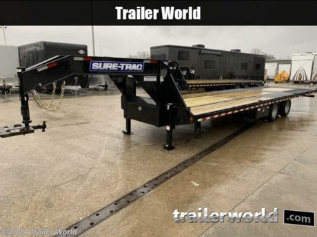 HD LOW PROFILE DECKOVER W/ HYDRAULIC BEAVERTAIL
Featuring a 10&#226;?&#178; Hydraulic Beavertail equipped with heavy duty 5&#226;?&#179; bore twin lift cylinders and 8,000 lb. lifting capacity, the Heavy Duty Deckover with Hydraulic Beavertail is the most versatile trailer of it&#39;s kind. Built with heavy duty I-Beam main frame and gooseneck and featuring dual heavy duty 12K drop leg jacks, toolbox, stake pockets, rub rail, and chain spools, this trailer is proven dependable for even the toughest jobs.
12,000LBS AXLES
CLEATED RUNNERS


Standard Features
Pierced I-Beam Frame
Cross Trac Bracing, Four Times Stronger than Torque Tube
I-Beam Gooseneck
Adjustable 2-5/16&quot; Ball (Gooseneck)
Safety Chains
7-Way RV-Style Molded Plug
Breakaway Switch with Battery
EverLink(tm) Wiring Harness
Sealed Brake Connections
Dual-HD 12k Jacks with Toolbox
10&#39; Hydraulic Beavertail
HD Slipper Spring Axles
Oil Filled Hubs
16&quot; Radial Tires
Silver Wheels
Wheel Assembly, 235 80R16 LRE 4.77 Silver Dual
Powder Coat Finish
Pressure Treated 2&quot; x 6&quot; Decking
Diamond Plate Deck Over Wheels
(10) 5/8&quot; D-Rings
Chain Spools
Stake Pockets and Rub Rail
Spare Tire Carrier
Side Steps
Underbody Side Mount Control Box
All LED Lights
Deep Cycle Battery
Battery Charger, 110V
HD 5&quot; Bore Twin Lift Cylinder in Beavertail
Power-Up, Power-Down Hydraulics
Limited 3-Year Warranty
While we strive to represent our trailers with 100% accuracy - please call to confirm details of trailer.