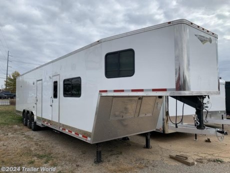 2022 40&#39; Vintage Outlaw Custom Toy Hauler
WE COMPLETELY WINTERIZED THIS UNIT. WE ALSO CHECKED THE WIRING AND THE TIRES. IT IS READY TO GO PLAY.
12&#39; XE Layout 8&#39;GN = 20&#39; Garage
(3) 5200# Axles
Propane Package
Black Vinyl Furniture
6&#39; Fold Down Sleeper
6&#39; Sleeper Sofa
Vented Bathroom Chamber
.040 Screwless White Exterior
Tapered Nose for Sharper Turn Radius
12&quot; Extra Height
16&quot; Tall Straight Overhead Cabinet
Hydraulic Jack
Insulate Ceiling and Walls in Garage
16&quot; Aluminum Wheels
Microwave
Electric Refridgerator
6 Gallon Hot Water Heater
50 AMP Electrical Package
32&quot; Side Door W/Pull Out Step
13.5k BTU A/C w/Thermostat
AM/FM Stereo System W/4 Speakers
TV Antenna


While we strive to represent our trailers with 100% accuracy - please call to confirm details of trailer.