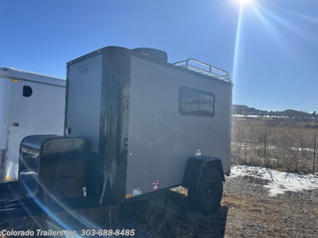 &lt;p&gt;&lt;span style=&quot;font-family: arial, helvetica, sans-serif; font-size: 18px;&quot;&gt;Used 2023 5x10 Off Road Colorado Cargo Trailer for sale.&amp;nbsp; Trailer features:&lt;/span&gt;&lt;/p&gt;
&lt;p&gt;&lt;span style=&quot;font-family: arial, helvetica, sans-serif; font-size: 18px;&quot;&gt;3500lb. torsion axle with brake&lt;/span&gt;&lt;br&gt;&lt;span style=&quot;font-size: 18px; font-family: arial, helvetica, sans-serif;&quot;&gt;16&quot; inch on center walls, floor and ceiling&lt;br&gt;Mud Terrain Tires&lt;br&gt;Removable Coupler&lt;/span&gt; &lt;br&gt;&lt;span style=&quot;font-size: 18px; font-family: arial, helvetica, sans-serif;&quot;&gt;6 foot interior height&lt;br&gt;5x4 roof rack and ladder&lt;/span&gt;&lt;br&gt;&lt;span style=&quot;font-size: 18px; font-family: arial, helvetica, sans-serif;&quot;&gt;Side door with RV lock and cam bar&lt;br&gt;Rear ramp door with deck option&lt;br&gt;Fold down RV step at side door&lt;/span&gt;&lt;br&gt;&lt;span style=&quot;font-family: arial, helvetica, sans-serif;&quot;&gt;&lt;span style=&quot;font-size: 18px;&quot;&gt;Nudo floor and ramp &lt;/span&gt;&lt;/span&gt;&lt;br&gt;&lt;span style=&quot;font-family: arial, helvetica, sans-serif; font-size: 18px;&quot;&gt;Blackout package&lt;/span&gt;&lt;br&gt;&lt;span style=&quot;font-family: arial, helvetica, sans-serif; font-size: 18px;&quot;&gt;Insulated walls and ceiling&lt;/span&gt;&lt;br&gt;&lt;span style=&quot;font-family: arial, helvetica, sans-serif; font-size: 18px;&quot;&gt;Aluminum wall and ceiling liner&lt;/span&gt;&lt;br&gt;&lt;span style=&quot;font-family: arial, helvetica, sans-serif; font-size: 18px;&quot;&gt;A/C unit with heat strip&lt;br&gt;30 amp power package with 4 interior outlets and 1 exterior GFI&lt;/span&gt;&lt;br&gt;&lt;span style=&quot;font-family: arial, helvetica, sans-serif; font-size: 18px;&quot;&gt;Battery and box with charger&lt;/span&gt;&lt;br&gt;&lt;span style=&quot;font-family: arial, helvetica, sans-serif; font-size: 18px;&quot;&gt;2 - 18x44 slider windows with screens&lt;/span&gt;&lt;br&gt;&lt;span style=&quot;font-family: arial, helvetica, sans-serif; font-size: 18px;&quot;&gt;4 LED interior lights with wall switch&lt;/span&gt;&lt;br&gt;&lt;span style=&quot;font-family: arial, helvetica, sans-serif; font-size: 18px;&quot;&gt;2 4 foot LED interior light&lt;/span&gt;&lt;br&gt;&lt;span style=&quot;font-family: arial, helvetica, sans-serif; font-size: 18px;&quot;&gt;2 LED exterior load/spot lights&lt;br&gt;&lt;/span&gt;&lt;span style=&quot;font-family: arial, helvetica, sans-serif; font-size: 18px;&quot;&gt;LED exterior party light&lt;/span&gt;&lt;br&gt;&lt;span style=&quot;font-family: arial, helvetica, sans-serif; font-size: 18px;&quot;&gt;LED exterior running lights&lt;/span&gt;&lt;br&gt;&lt;span style=&quot;font-family: arial, helvetica, sans-serif; font-size: 18px;&quot;&gt;Stabilizer jacks&lt;/span&gt;&lt;br&gt;&lt;span style=&quot;font-family: arial, helvetica, sans-serif; font-size: 18px;&quot;&gt;Triple tube tongue&lt;br&gt;Sold as is, no warranty.&lt;br&gt;&lt;br&gt;&lt;br&gt;&lt;/span&gt;&lt;span style=&quot;font-family: arial, helvetica, sans-serif; font-size: 18px;&quot;&gt;Dealer Stock #16653&lt;/span&gt;&lt;br&gt;&lt;span style=&quot;font-family: arial, helvetica, sans-serif; font-size: 18px;&quot;&gt;Year: 2023&lt;/span&gt;&lt;br&gt;&lt;span style=&quot;font-family: arial, helvetica, sans-serif; font-size: 18px;&quot;&gt;Make: Cargo Craft&lt;/span&gt;&lt;br&gt;&lt;span style=&quot;font-family: arial, helvetica, sans-serif; font-size: 18px;&quot;&gt;Model: 5x10&lt;/span&gt;&lt;br&gt;&lt;span style=&quot;font-family: arial, helvetica, sans-serif; font-size: 18px;&quot;&gt;Color: Matte Gray&amp;nbsp;Blackout&lt;/span&gt;&lt;br&gt;&lt;span style=&quot;font-family: arial, helvetica, sans-serif; font-size: 18px;&quot;&gt;Weight: 1500lbs.&lt;/span&gt;&lt;/p&gt;
&lt;p&gt;&lt;span style=&quot;font-family: arial, helvetica, sans-serif; font-size: 18px;&quot;&gt;Give us a call we would like to earn your business 303-688-8485 - Not near us? Shipping options available with great rates! Call to inquire.&lt;/span&gt;&lt;/p&gt;