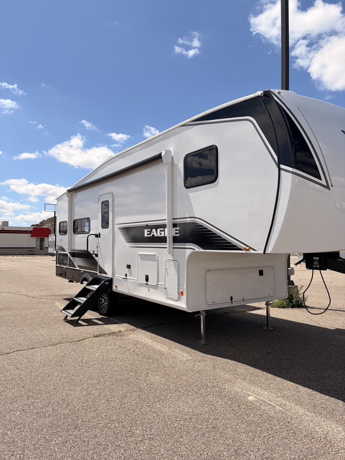 2026 Jayco Eagle SLE 24MLE - New Fifth Wheel For Sale by First Choice RVs in Rock Springs, Wyoming features Water Heater, Queen Bed, Detachable Power Cord, Microwave, Black Tank Flush