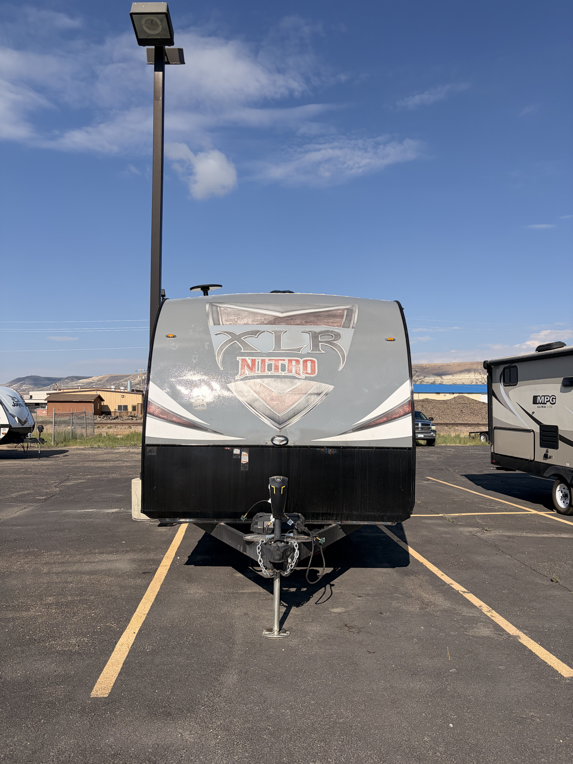2018 Forest River XLR Nitro 23KW - Used Toy Hauler For Sale by First Choice RVs in Rock Springs, Wyoming features Microwave, Self Contained, TV, Bluetooth Stereo, Furnace