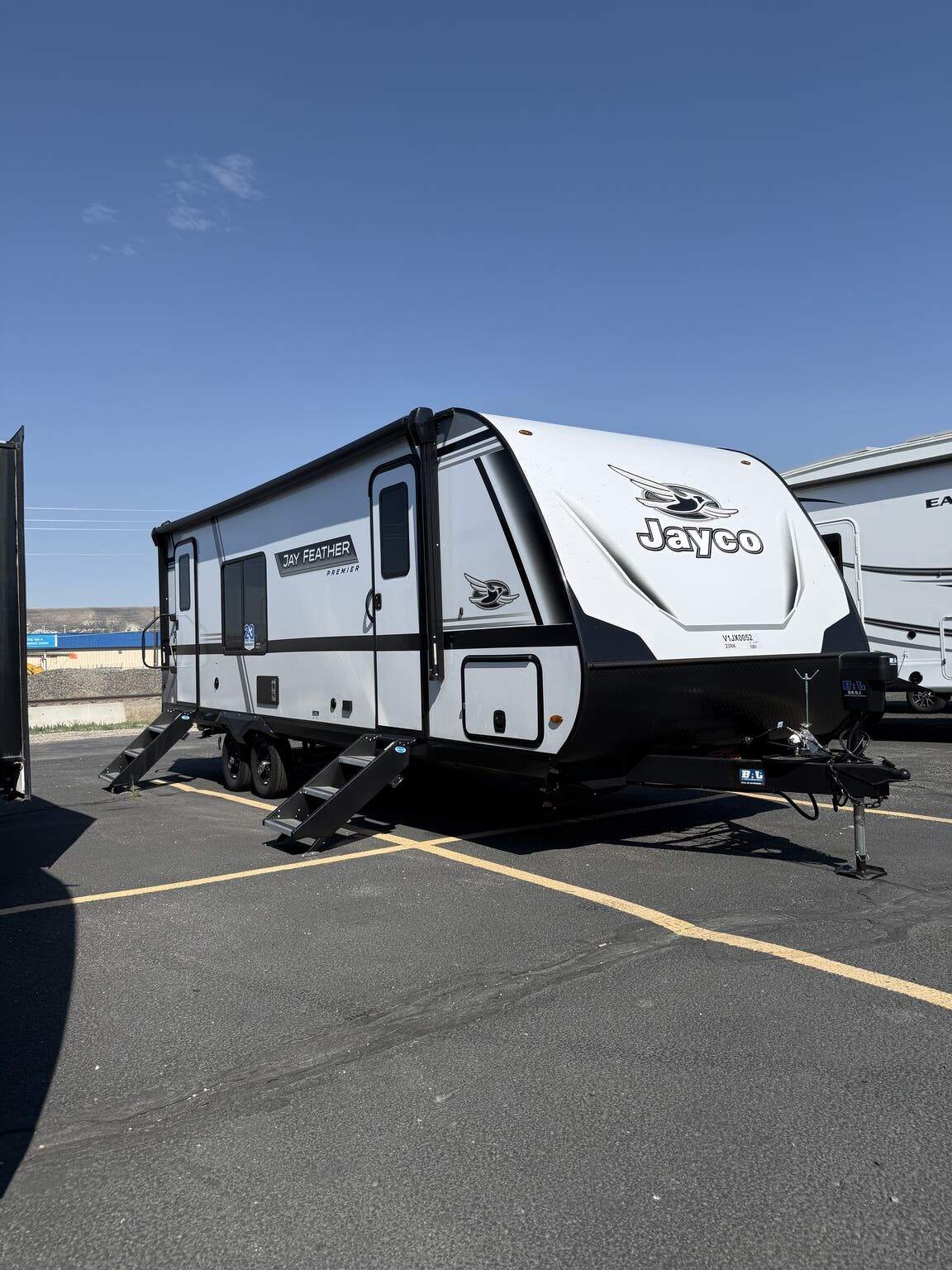 2027 Jayco Jay Feather 23RK - New Travel Trailer For Sale by First Choice RVs in Rock Springs, Wyoming features Skylight, Converter, Solar Panel, Black Tank Flush, TV