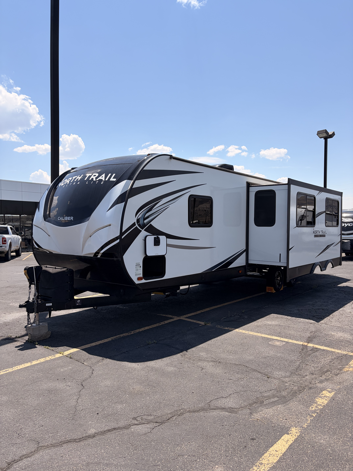 2021 Heartland North Trail 31BHDD - Used Travel Trailer For Sale by First Choice RVs in Rock Springs, Wyoming features Air Conditioning, Furnace, Self Contained, Smoke Detector, Toilet
