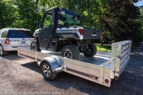 &lt;p&gt;2023 FLOE Versa Max 10.5x79&lt;/p&gt;
&lt;p&gt;3500lb galvanized axle, LED lighting, 3 position tilt mechanism, Bi fold rear ramp, Aluminum deck, Quick attach track with tie downs, Aluminum wheels with radial tires, Side steps, Swivel tongue jack&lt;/p&gt;
&lt;p&gt;&amp;nbsp;&lt;/p&gt;
&lt;p&gt;25&quot; tall side kit included!!!!&lt;/p&gt;
&lt;p&gt;Spare and mount available&lt;/p&gt;