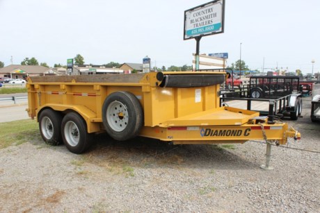 RENTAL UNIT AT OUR CARTERVILLE STORE. $125 PER DAY OR $500 PER WEEK. DIAMOND C 12  X 82  HEAVY DUTY DUMP TRAILER, REQUIRES 2-5/16  BALL FOR TOWING, REAR SPREADER GATE, REAR SLIDE-IN RAMPS FOR HAULING EQUIPMENT, 2-7K AXLES WITH PAYLOAD CAPACITY OF 10,100 LBS, TARP KIT INSTALLED FOR COVERING YOUR LOAD. WE STOCK AN ELITE RENTAL FLEET WITH OPTIONS TO MAKE THE JOB EASIER.