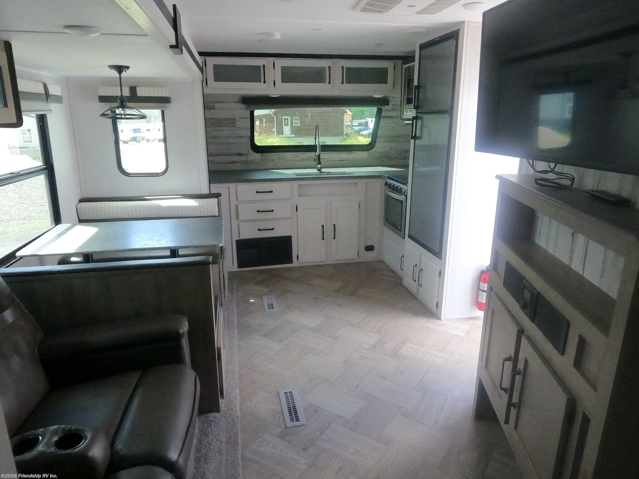 2021 Palomino Puma 26FKDS - Used Travel Trailer For Sale by Friendship RV Inc. in Friendship, Wisconsin features CO Detector, Auxiliary Battery, Batteries, Slideout, Refrigerator