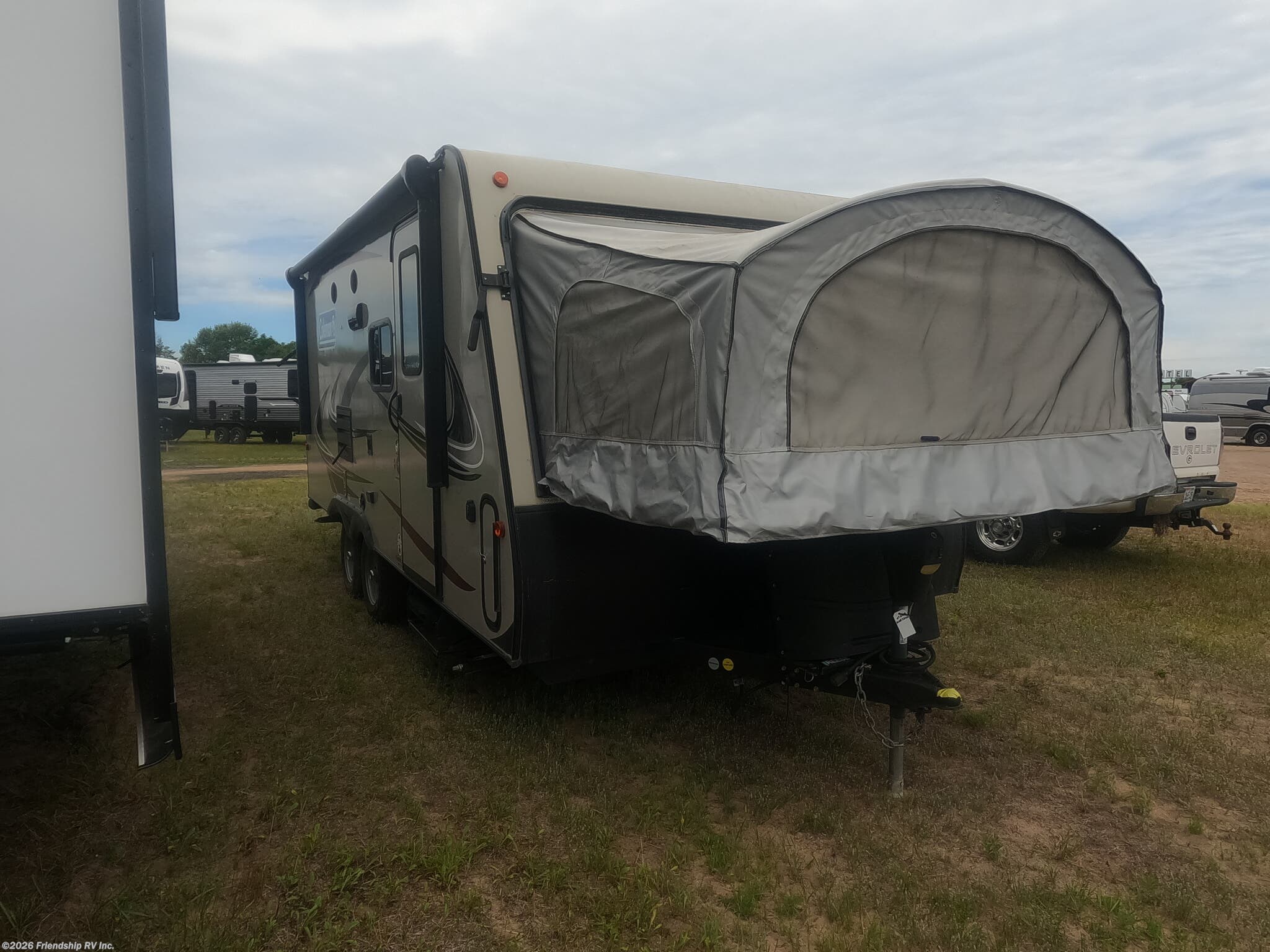 2019 Dutchmen Coleman Light LX 1701exp - Used Expandable Trailer For Sale by Friendship RV Inc. in Friendship, Wisconsin features Power Awning, Auxiliary Battery, Stove, Microwave, Refrigerator