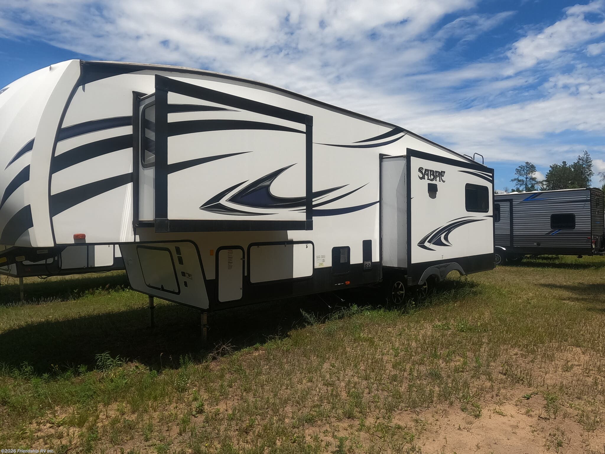 2018 Forest River Sabre 30RLT - Used Fifth Wheel For Sale by Friendship RV Inc. in Friendship, Wisconsin features CO Detector, Smoke Detector, Oven, LP Detector, Refrigerator