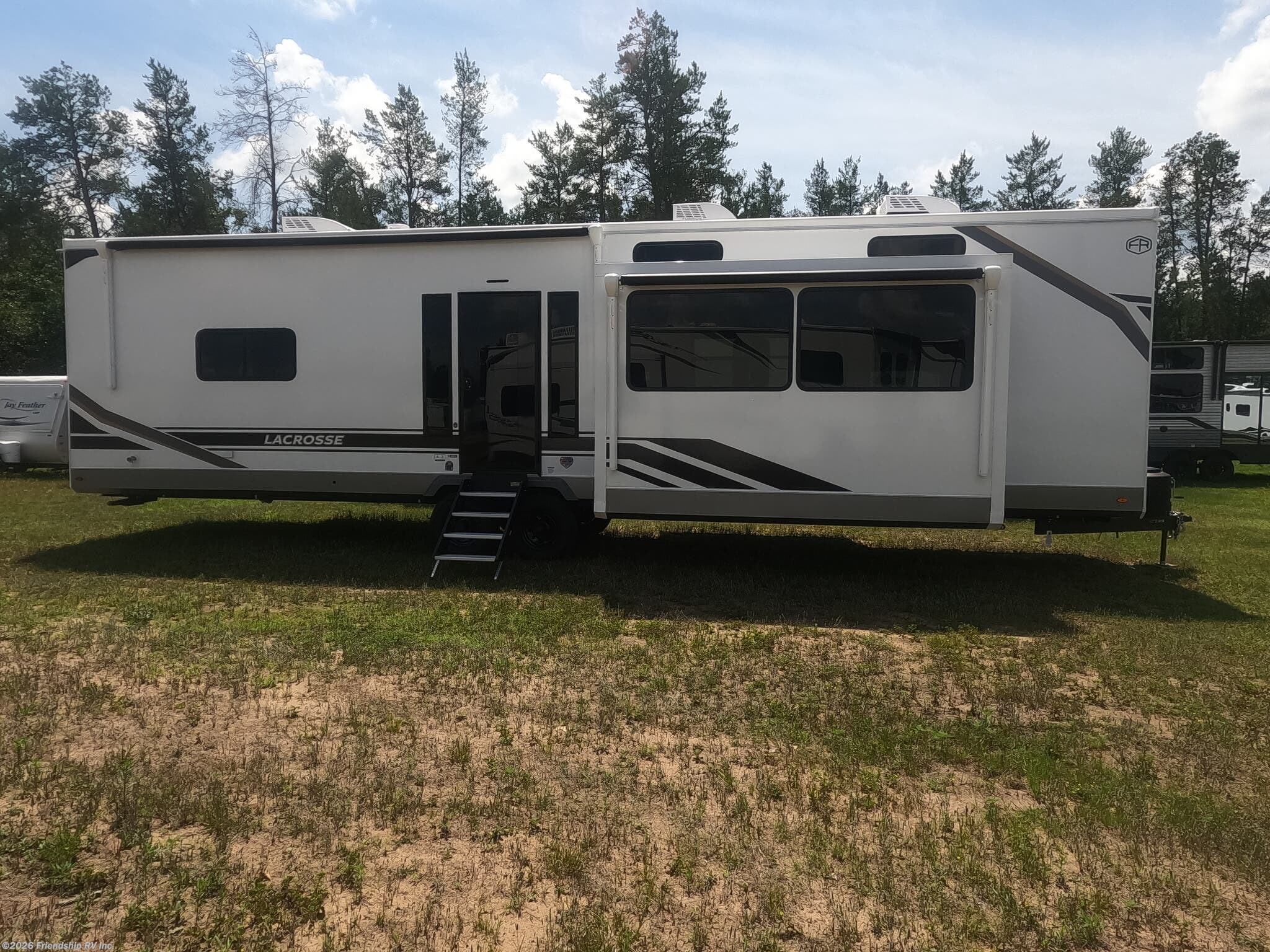 2027 Prime Time LaCrosse 39FK - New Destination Trailer For Sale by Friendship RV Inc. in Friendship, Wisconsin features TV, Tankless Demand Gas Water Heater, Air Conditioning, PVC Roof, Furnace