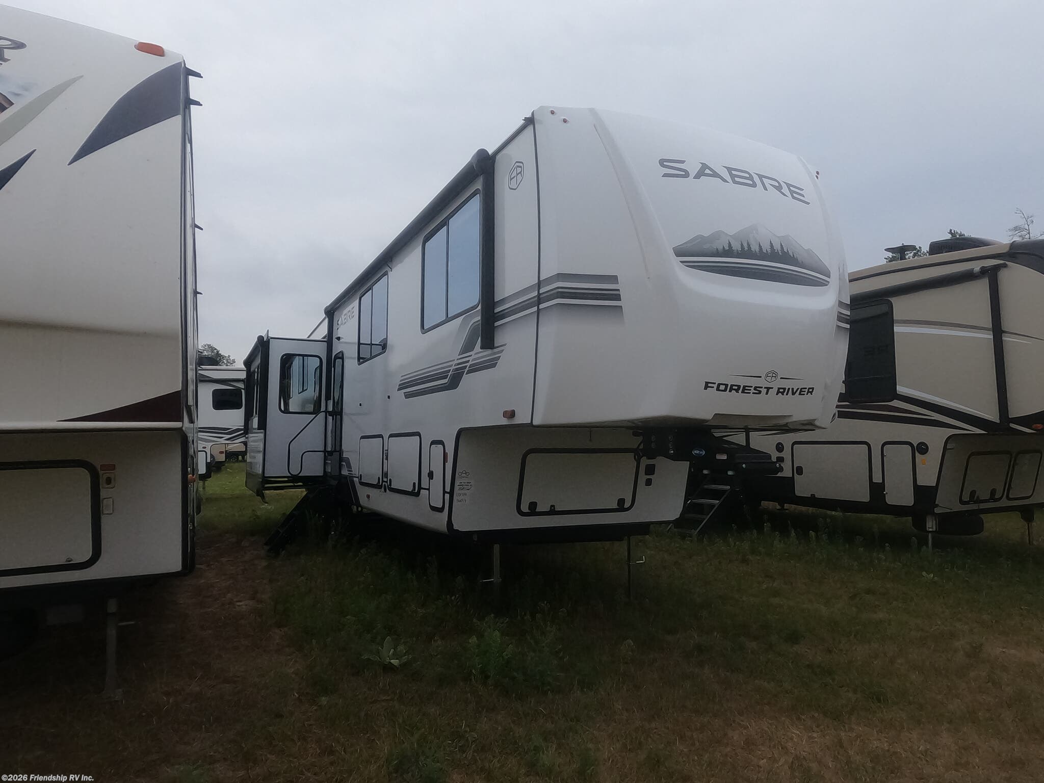 2027 Forest River Sabre 36FLX - New Fifth Wheel For Sale by Friendship RV Inc. in Friendship, Wisconsin features Fireplace, Dryer, Pantry, TV, Awning
