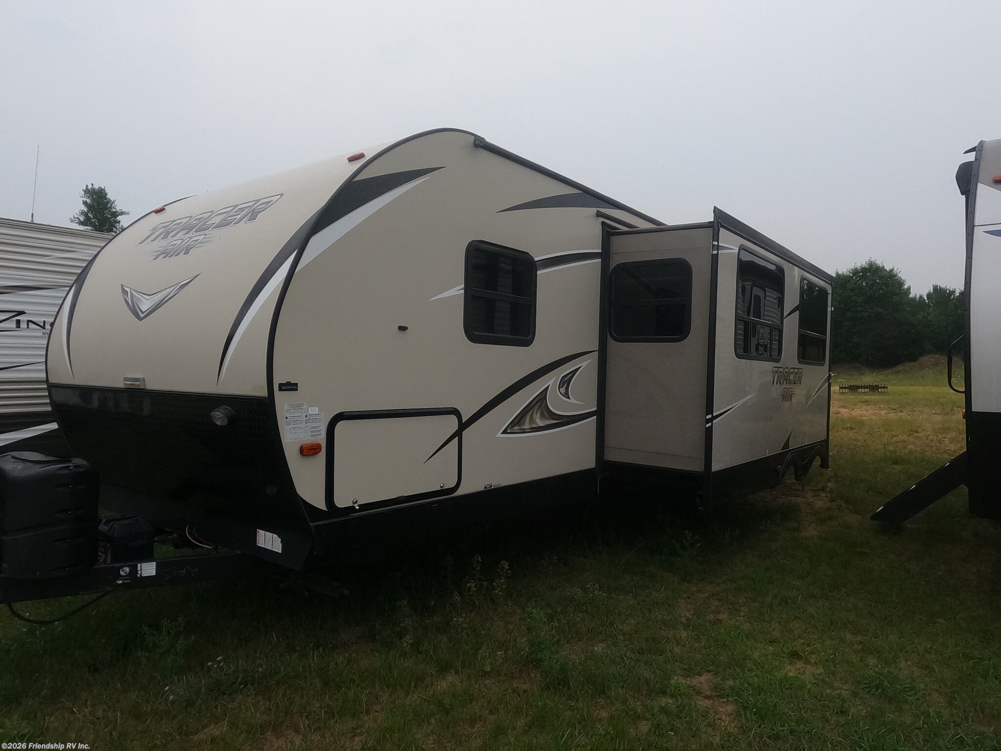 2017 Forest River Tracer 275BH - Used Travel Trailer For Sale by Friendship RV Inc. in Friendship, Wisconsin features Queen Bed, TV Antenna, Smoke Detector, Refrigerator, Self Contained