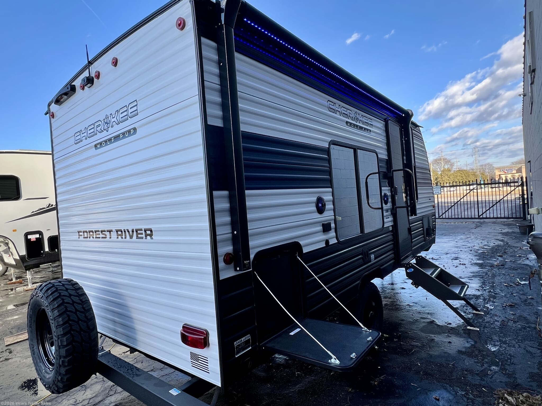 2025 Forest River Cherokee Wolf Pup 16FQW - New Travel Trailer For Sale by Vicars Trailer Sales in Taylor, Michigan features Fire Extinguisher, Insulated, Exterior Speakers, Spare Tire Kit, Surround Sound System