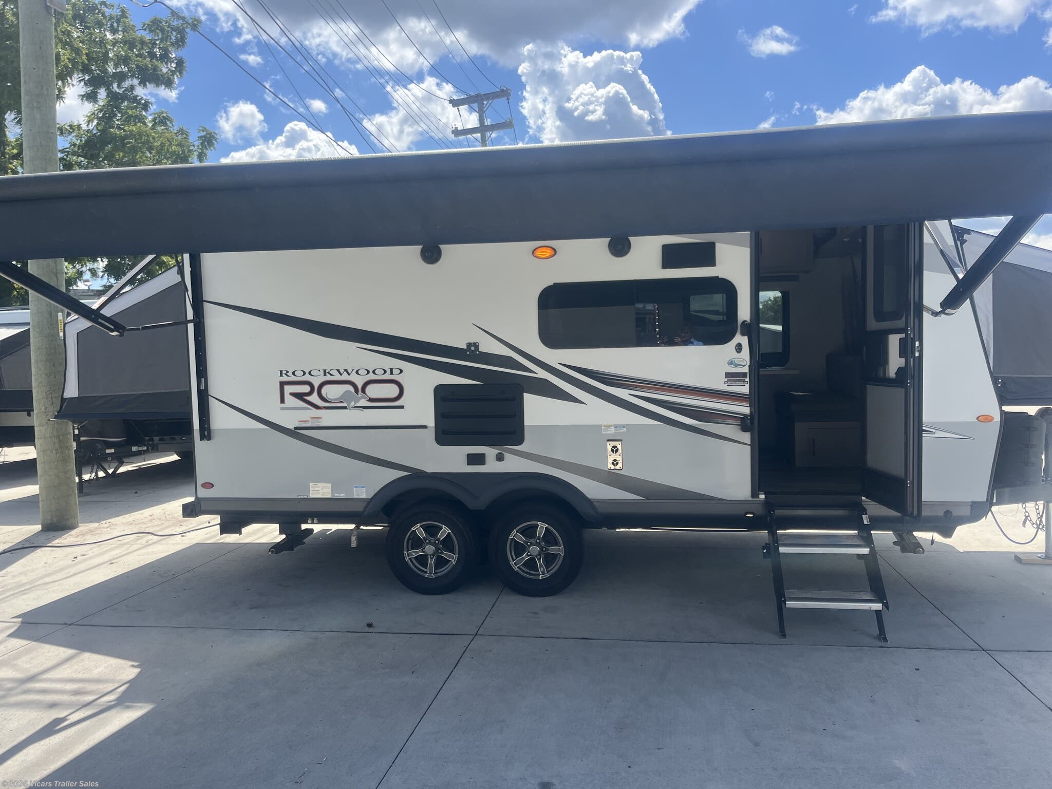 2022 Forest River Rockwood Roo 183 - Used Expandable Trailer For Sale by Vicars Trailer Sales in Taylor, Michigan features Power Roof Vent, Smoke Detector, Shower, Exterior Speakers, TV