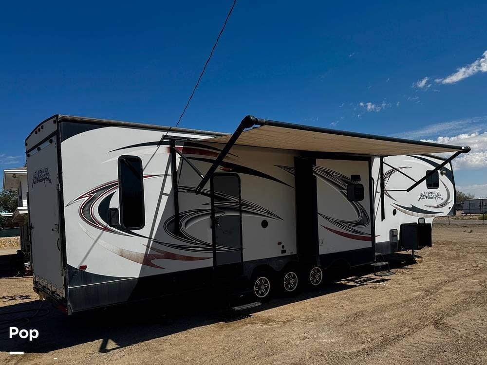 2015 Forest River Vengeance F398V - Used Toy Hauler For Sale by Pop RVs in El Paso, Texas features Air Conditioning, Slideout, Awning, Generator, Leveling Jacks