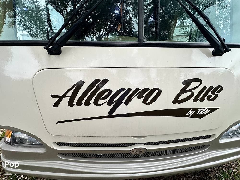 2000 Tiffin Allegro Bus 28 - Used Class A For Sale by Pop RVs in Houston, Texas features Generator, Air Conditioning