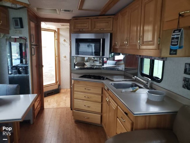 1998 Beaver Monterey 3600 - Used Diesel Pusher For Sale by Pop RVs in Newport, Michigan features Awning, Slideout, Leveling Jacks, Generator, Air Conditioning