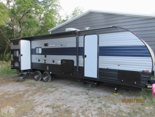 2020 Forest River Grey Wolf 27DBH - Used Travel Trailer For Sale by Pop RVs in Thonotosassa, Florida features Air Conditioning, Leveling Jacks, Awning, Slideout