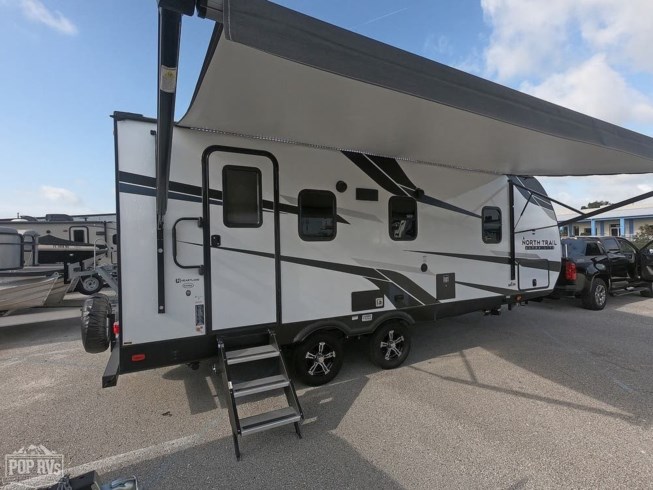 2022 Heartland North Trail 22RBS - Used Travel Trailer For Sale by Pop RVs in Leesburg, Florida features Air Conditioning, Leveling Jacks, Awning, Slideout