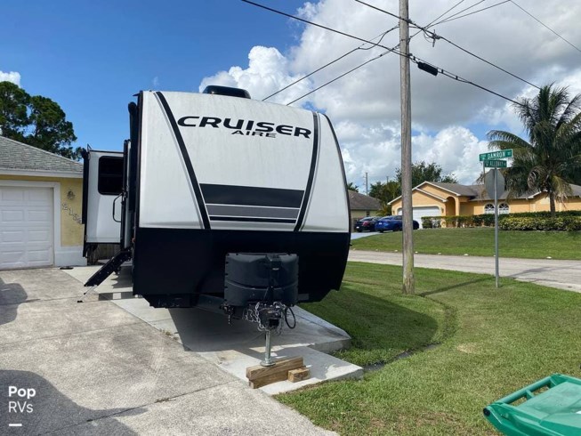 2021 CrossRoads Cruiser 30RLS - Used Travel Trailer For Sale by Pop RVs in Port Saint Lucie, Florida features Awning, Leveling Jacks, Slideout, Air Conditioning