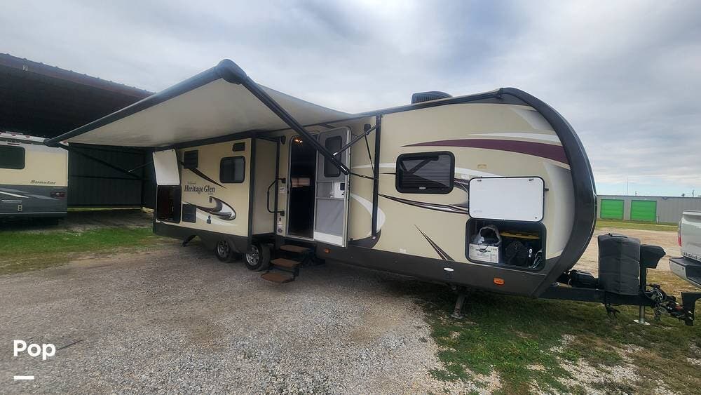 2015 Forest River Heritage Glen 272RLIS - Used Travel Trailer For Sale by Pop RVs in Godley, Texas features Slideout, Leveling Jacks, Air Conditioning, Awning