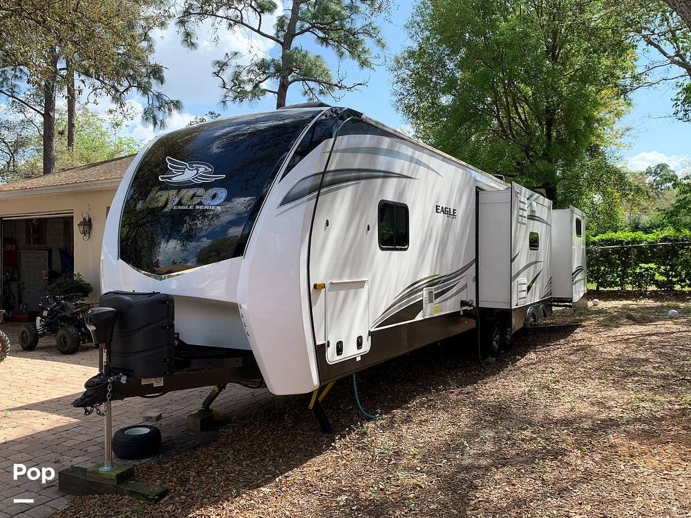 2022 Jayco Eagle 312BHOK - Used Travel Trailer For Sale by Pop RVs in Haines City, Florida features Awning, Slideout, Leveling Jacks, Air Conditioning