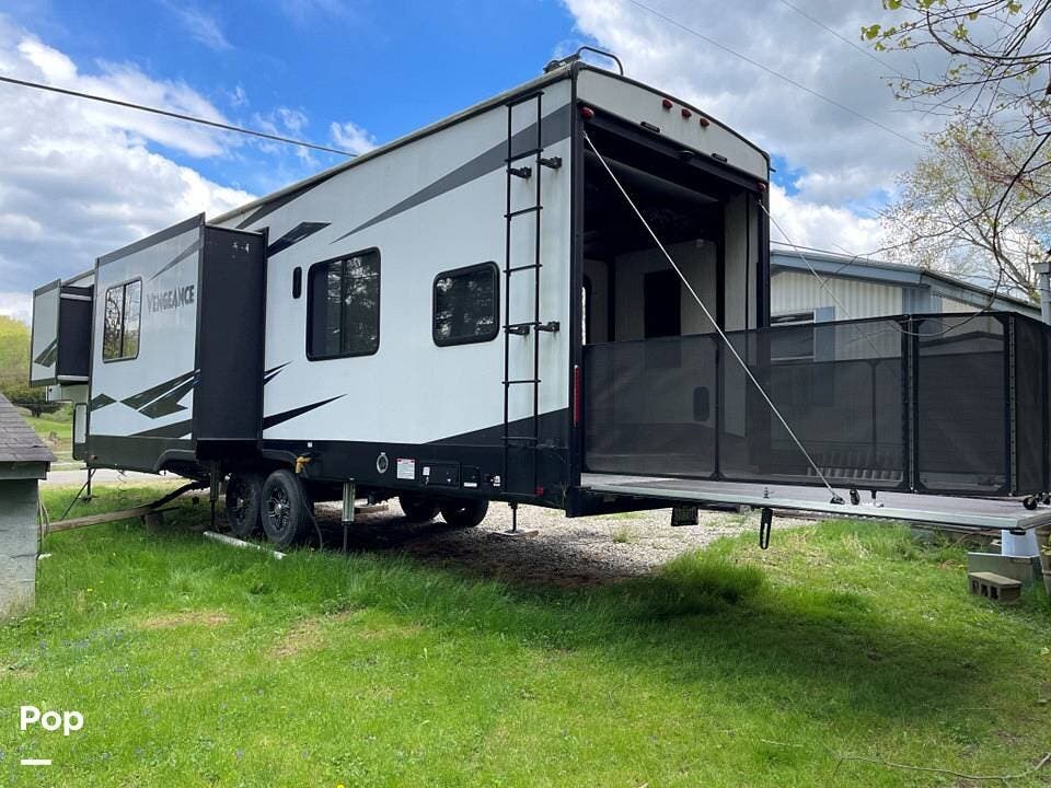 2019 Forest River Vengeance 345A13 - Used Toy Hauler For Sale by Pop RVs in Blue Rock, Ohio features Generator, Slideout, Awning, Air Conditioning, Leveling Jacks