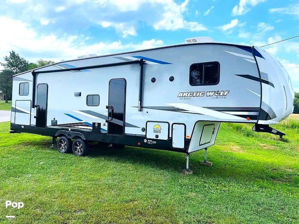 2022 Cherokee Arctic Wolf 321BH - Used Fifth Wheel For Sale by Pop RVs in Evansville, Indiana features Slideout, Leveling Jacks, Air Conditioning, Awning
