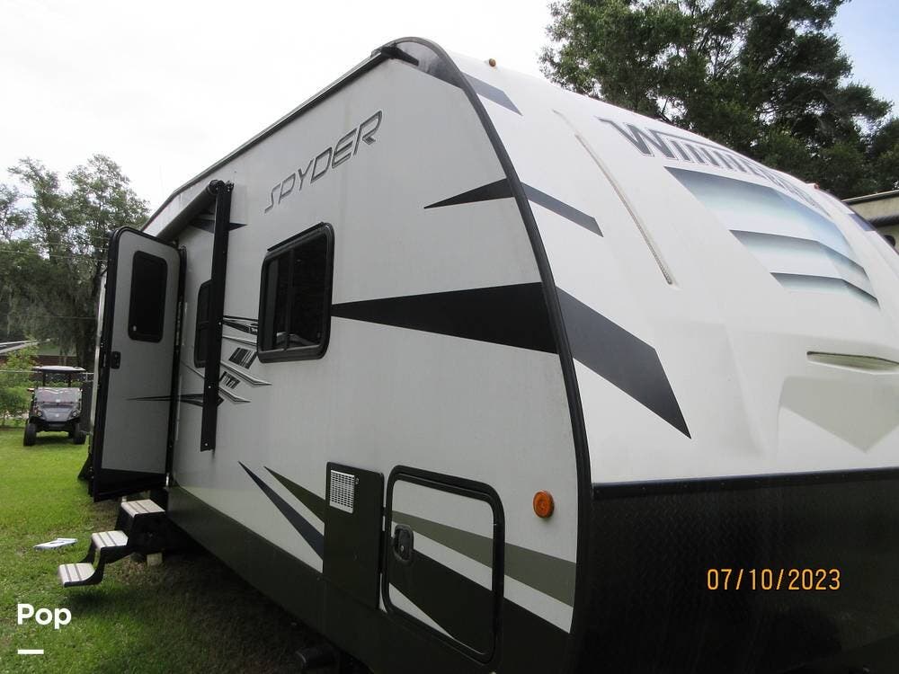 2020 Winnebago Spyder 29STT - Used Toy Hauler For Sale by Pop RVs in Plant City, Florida features Leveling Jacks, Generator, Slideout, Air Conditioning, Awning