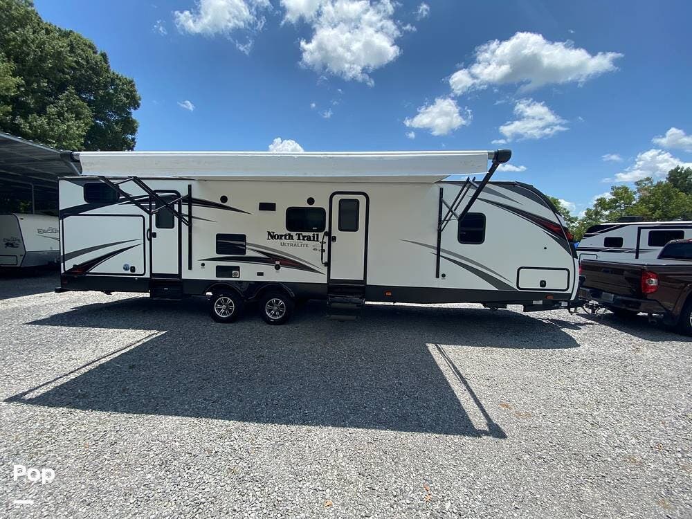 2017 Heartland North Trail 33BUDS - Used Travel Trailer For Sale by Pop RVs in Youngsville, Louisiana features Slideout, Air Conditioning, Leveling Jacks, Awning