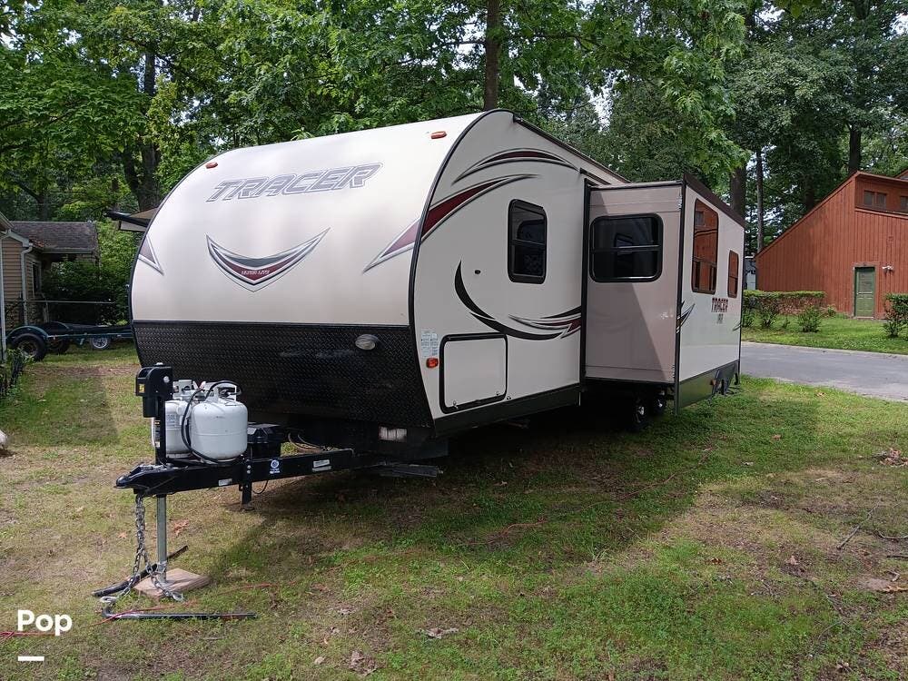 2017 Forest River Tracer 275AIR - Used Travel Trailer For Sale by Pop RVs in Brighton, Michigan features Awning, Slideout, Leveling Jacks, Air Conditioning