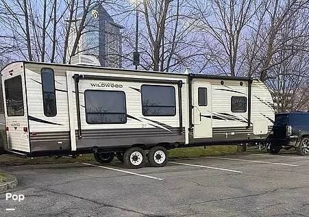 2019 Forest River Wildwood 27RE - Used Travel Trailer For Sale by Pop RVs in Plymouth, Massachusetts features Awning, Air Conditioning, Leveling Jacks, Slideout
