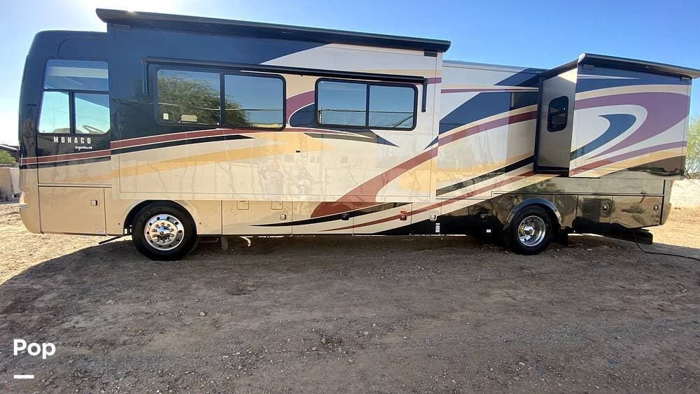 2011 Monaco RV Cayman 40PBQ - Used Diesel Pusher For Sale by Pop RVs in Phoenix, Arizona features Generator, Awning, Slideout, Air Conditioning, Leveling Jacks