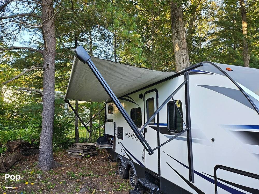 2020 Keystone Passport SL 240BH - Used Travel Trailer For Sale by Pop RVs in Bristol, Connecticut features Air Conditioning, Leveling Jacks, Slideout, Awning