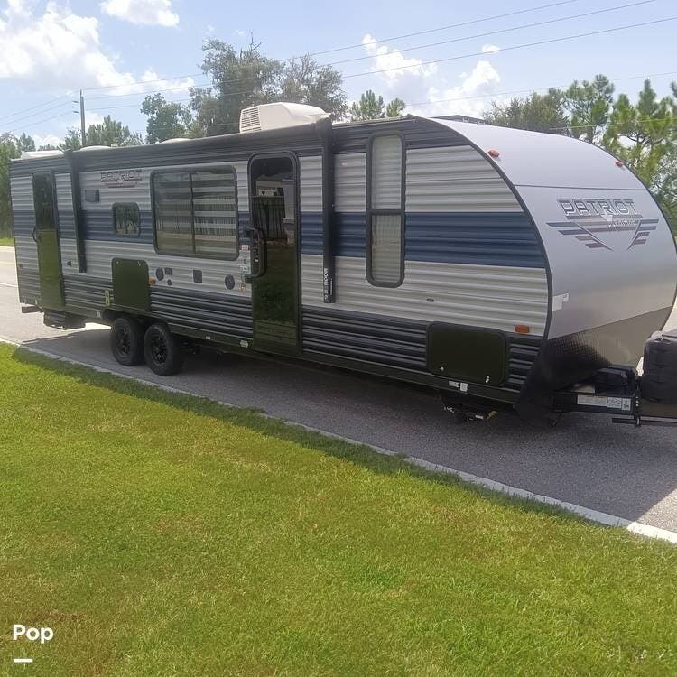 2021 Forest River Grey Wolf 26BRB - Used Travel Trailer For Sale by Pop RVs in Palm Coast, Florida features Air Conditioning, Awning, Slideout