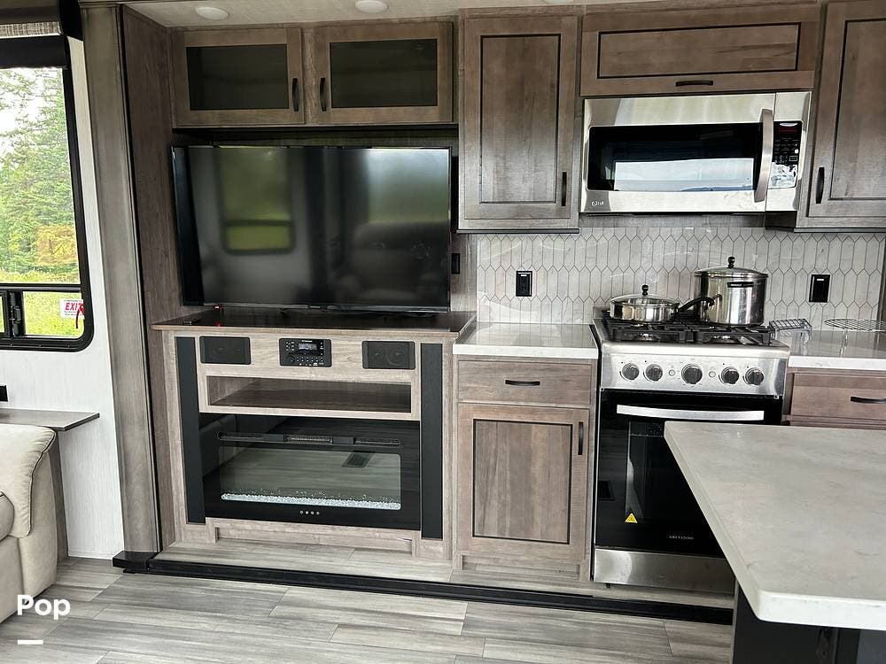 2022 Forest River Cedar Creek 40CRS - Used Travel Trailer For Sale by Pop RVs in Coeur D'alene, Idaho features Slideout, Air Conditioning, Leveling Jacks, Awning