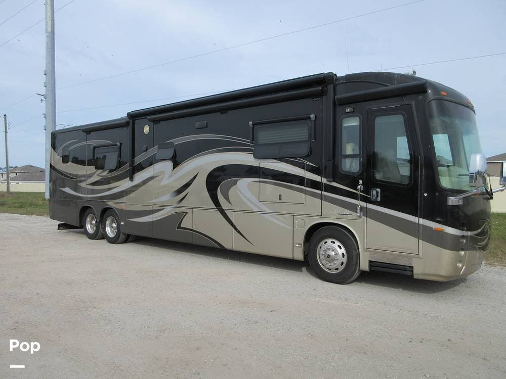 2011 Entegra Coach Aspire 42RB - Used Diesel Pusher For Sale by Pop RVs in Zephyrhills, Florida features Awning, Leveling Jacks, Air Conditioning, Generator, Slideout