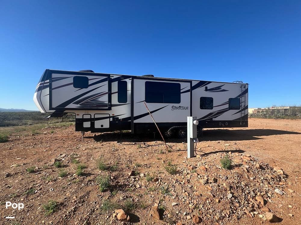 2017 Prime Time Spartan 1434X - Used Toy Hauler For Sale by Pop RVs in Green Valley, Arizona features Slideout, Leveling Jacks, Air Conditioning, Generator, Awning