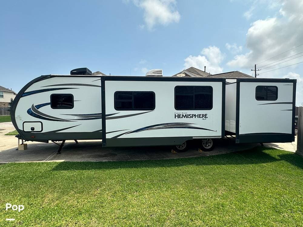 2019 Forest River Hemisphere 300BH - Used Travel Trailer For Sale by Pop RVs in Baytown, Texas features Awning, Leveling Jacks, Slideout, Air Conditioning