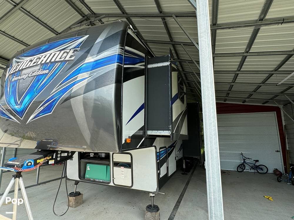 2019 Forest River Vengeance 395KB13 - Used Toy Hauler For Sale by Pop RVs in Darrow, Louisiana features Leveling Jacks, Slideout, Air Conditioning, Awning, Generator