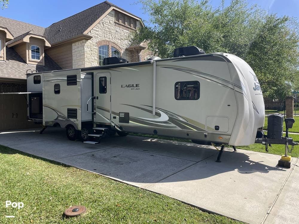 2019 Jayco Eagle 324 BHTS - Used Travel Trailer For Sale by Pop RVs in Dickinson, Texas features Air Conditioning, Leveling Jacks, Slideout, Awning